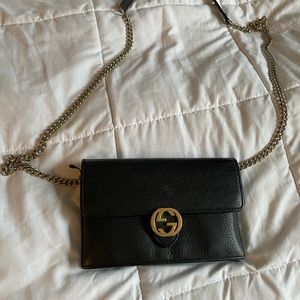 Black Gucci cross body bag